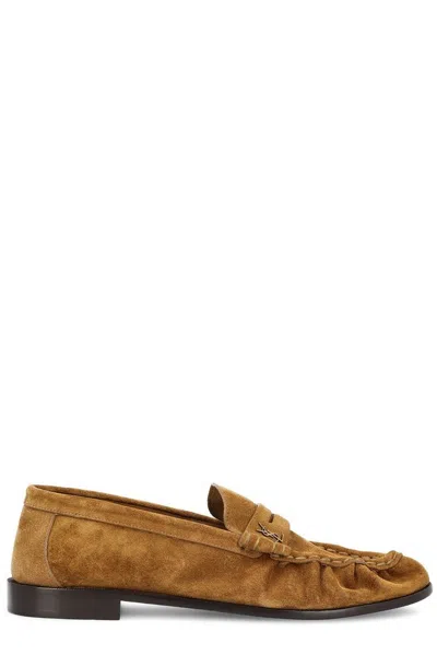 Saint Laurent Loafers Decorated With Cassandre. In Brown