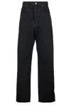 Saint Laurent Carrot-fit Jeans With A Washed Effect In Black