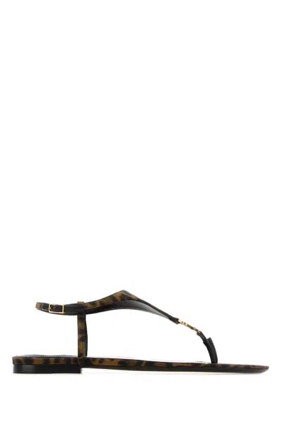 Saint Laurent Cassandre Thong Sandal In Black