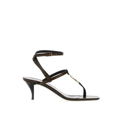 Saint Laurent Cassandra Leather Flip-flop Sandals Women