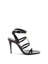 Saint Laurent Cassandra Ysl Medallion Leather Stiletto Sandals In Black