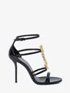 Saint Laurent Cassandra Sandals In Patent Leather With Gold-tone Monogram In Black