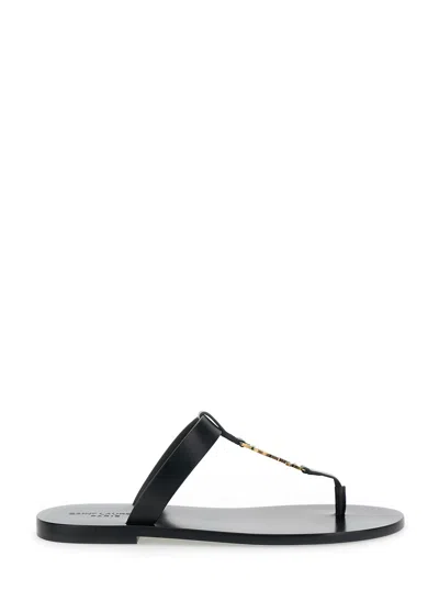 Saint Laurent Cassandre Black Flat Sandals With A T-strap In Leather Woman