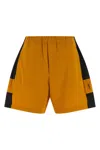 Saint Laurent Cassandre Bicolor Cotton Serge Bermuda Shorts In Yellow