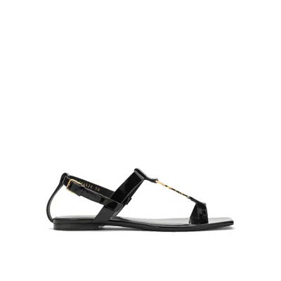 SAINT LAURENT CASSANDRE LEATHER FLAT SANDALS