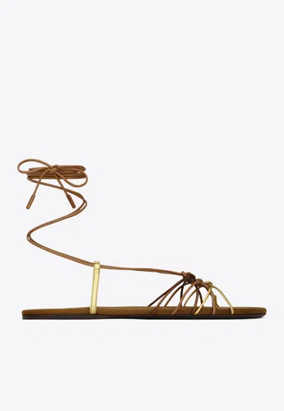 Saint Laurent Cassandre Leather Flat Strappy Sandals In Gold