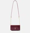 Saint Laurent Cassandre Strap Textured-leather Phone Case In Rouge Merlot