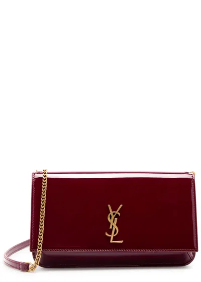 Saint Laurent Cassandre Patent Leather Phone Case In Burgundy