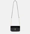 Saint Laurent Cassandre Strap Patent-leather Phone Case In Black
