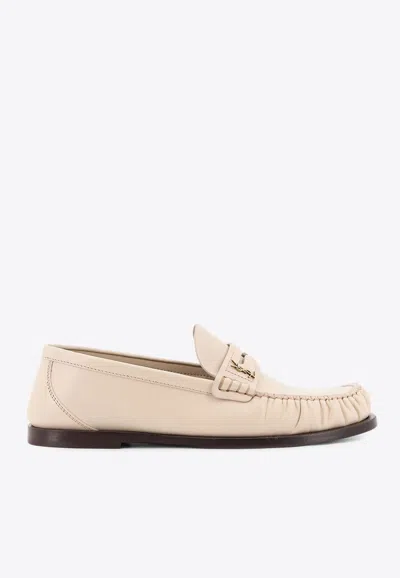 Saint Laurent Cassandre Penny-slot Leather Loafers In Neutro