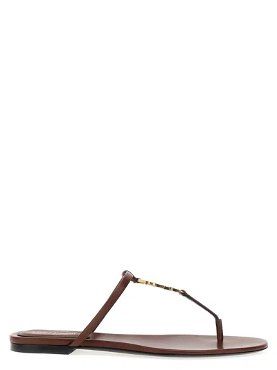 Saint Laurent Brown Leather Cassandre Thong Slippers In Aestheticbrownaest
