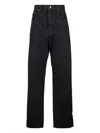 Saint Laurent Carrot-fit Jeans With A Washed Effect In Black