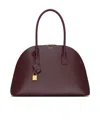 Saint Laurent Duffle Sac De Jour Souple En Cuir In Red