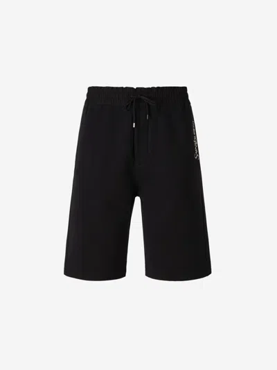 Saint Laurent Embroidered Logo Bermuda Shorts In Black