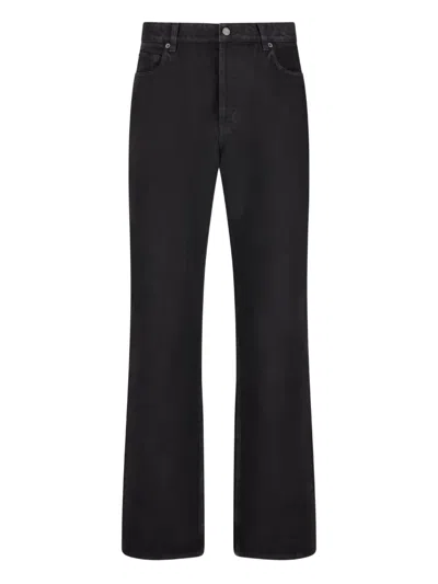Saint Laurent Flared-leg Jeans In Black