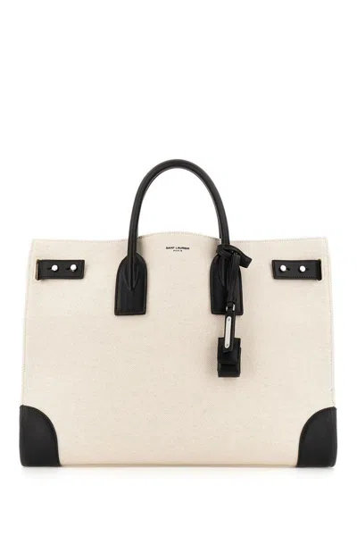 Saint Laurent Handbags. In Brown