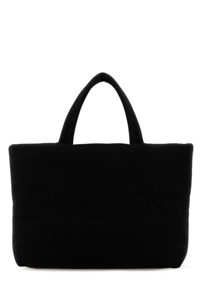 Saint Laurent Handbags. In Black