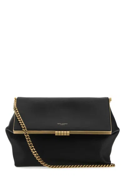 Saint Laurent Handbags. In Black