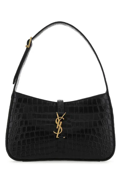 Saint Laurent Handbags. In Black