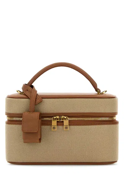 Saint Laurent Handbags. In Brown