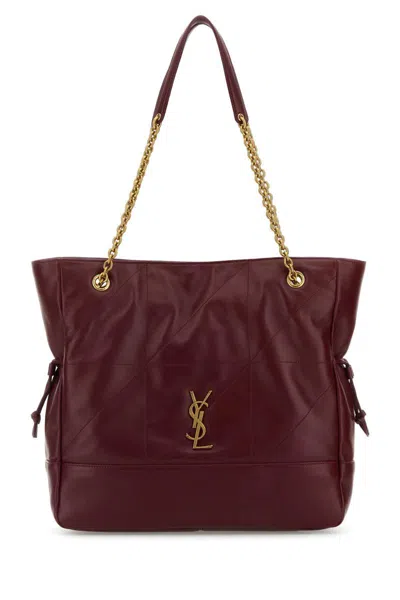 Saint Laurent Handbags. In Purple