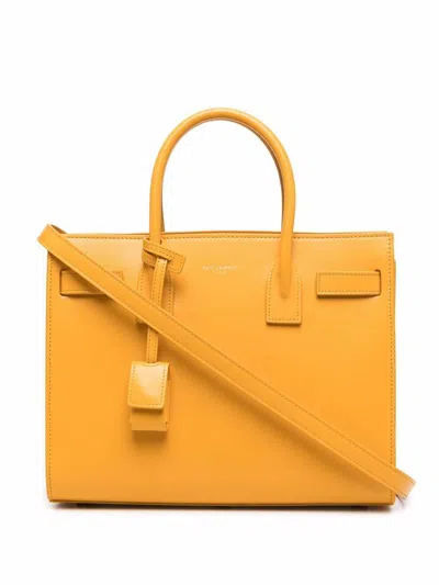 Saint Laurent Handbags In Yellow