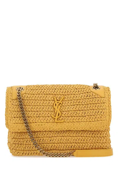 Saint Laurent Handbags. In Yellow