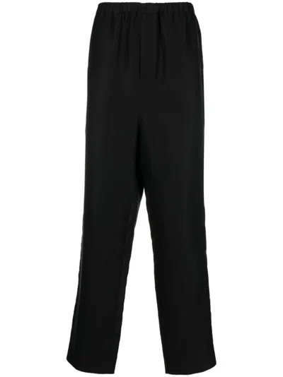 Saint Laurent High-waisted Tapered Trousers In Schwarz