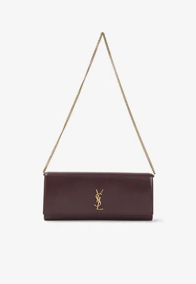 Saint Laurent Kate Calf Leather Clutch Bag In Burgundy