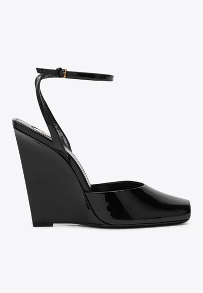 Saint Laurent La Scandale 110 Patent Leather Wedge Sandals In Black