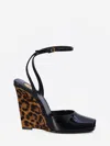 Saint Laurent Le Scandale 110 Patent Leather Wedge Sandals In Black
