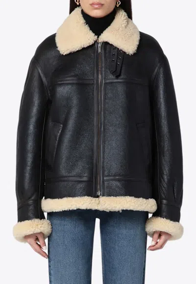 SAINT LAURENT LEATHER AND SHEARLING JACKET