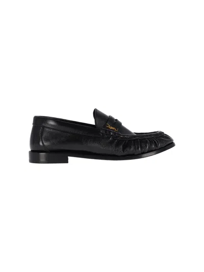 Saint Laurent Leather Fringe Loafers In Black
