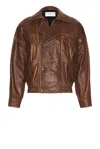 Saint Laurent Aged Lambskin Bomber Jacket In Brown