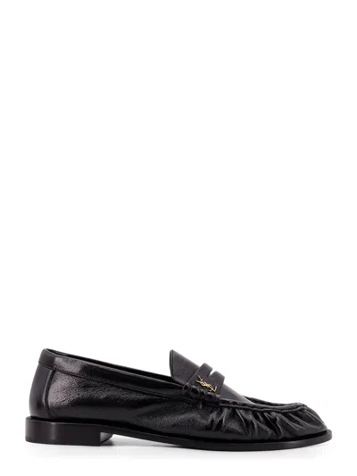 Saint Laurent Leather Loafer With Metal Monogram On The Front In Black