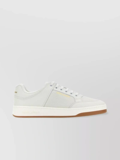 SAINT LAURENT LEATHER LOW-TOP SNEAKERS WITH PERFORATED DETAILING