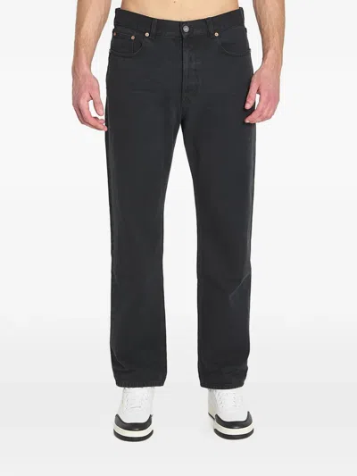Saint Laurent Leather-patch Five-pocket Jeans In Black