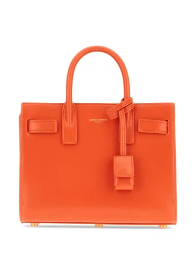 Saint Laurent Leather Top-handles Tote Bag In Orange