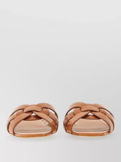 Saint Laurent Leather Tribute Mules In Brown