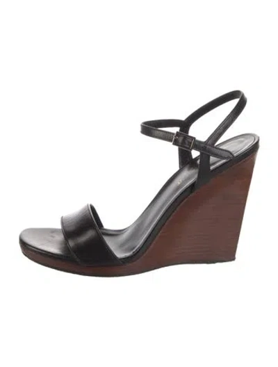Pre-owned Saint Laurent Leather T-strap Sandals In Black
