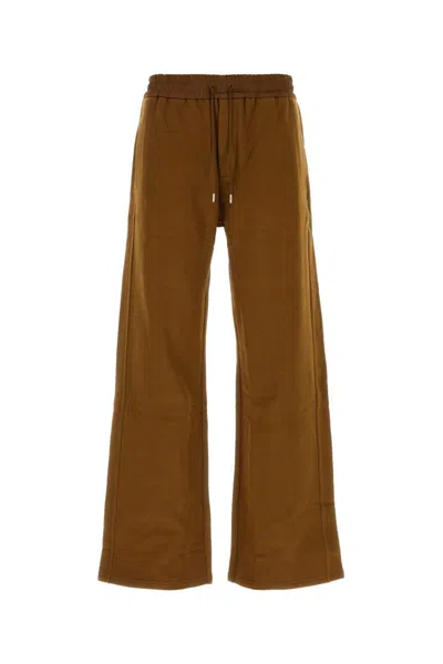 Saint Laurent Cotton Joggers With Back Pockets And Elastic Waistband In Brown