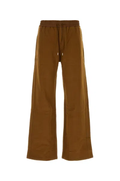 Saint Laurent Logo Embroidery Track Pants In Brown