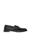 Saint Laurent Leather Loafer With Metal Monogram On The Front In Black
