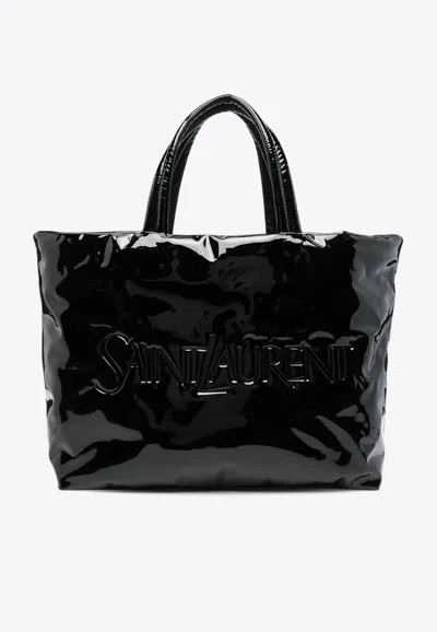 Saint Laurent Logo Debossed Tote Bag In Black