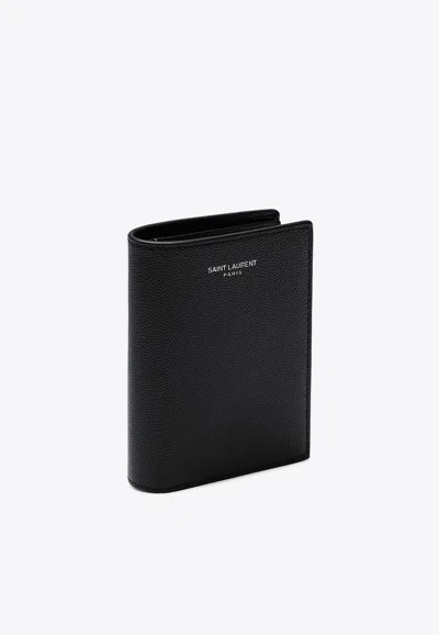 Saint Laurent Logo Embossed Bi-fold Wallet In Black
