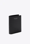 Saint Laurent Logo Stamped Leather Bi-fold Cardholder In Black