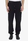 Saint Laurent Cuffed Fleeced Cotton Sweatpants With Nylon Detail In Black