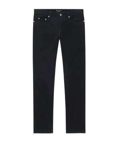 SAINT LAURENT LOW-RISE PANTS IN CORDUROY