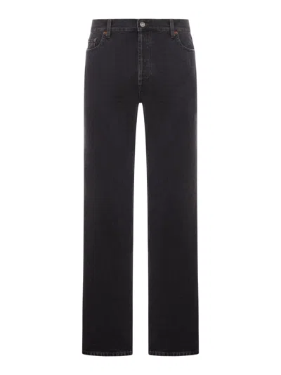 Saint Laurent Mick Long Jeans In Westwood Black Denim In Brown