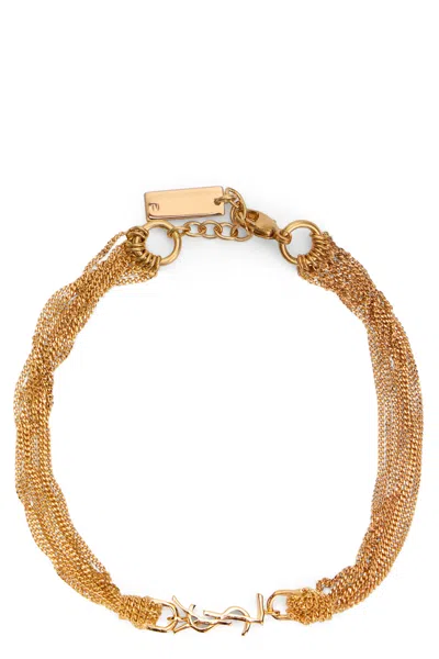 Saint Laurent Mini Metal Bracelet With Tassel In Gold